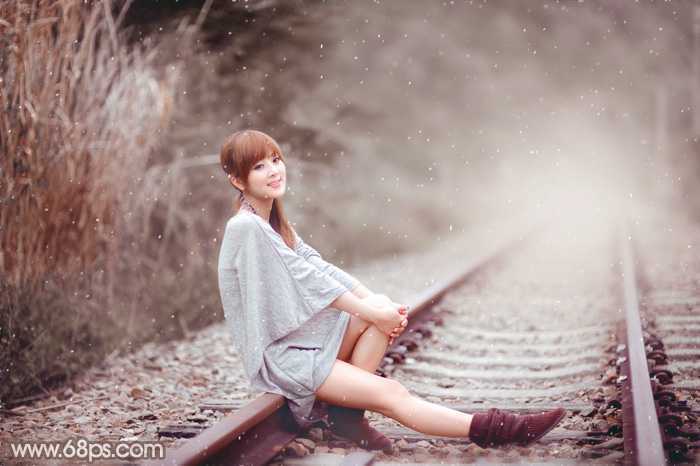 ‘Photoshop调出唯美的冬季红褐色铁轨美女图片‘