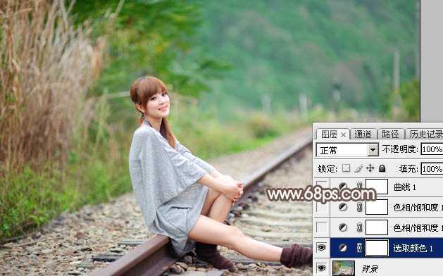 ‘Photoshop调出唯美的冬季红褐色铁轨美女图片‘