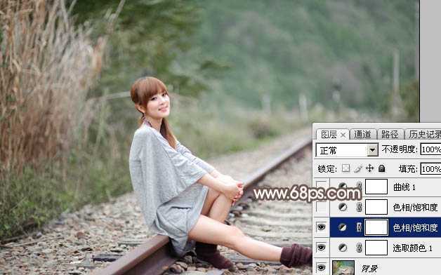 ‘Photoshop调出唯美的冬季红褐色铁轨美女图片‘