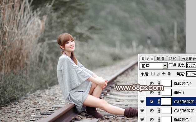 ‘Photoshop调出唯美的冬季红褐色铁轨美女图片‘