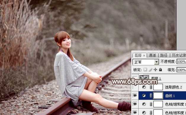 ‘Photoshop调出唯美的冬季红褐色铁轨美女图片‘
