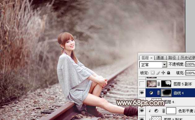 ‘Photoshop调出唯美的冬季红褐色铁轨美女图片‘