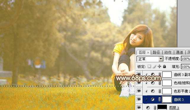 ‘Photoshop将坐在草地上的美女调制出漂亮的秋季阳光色‘