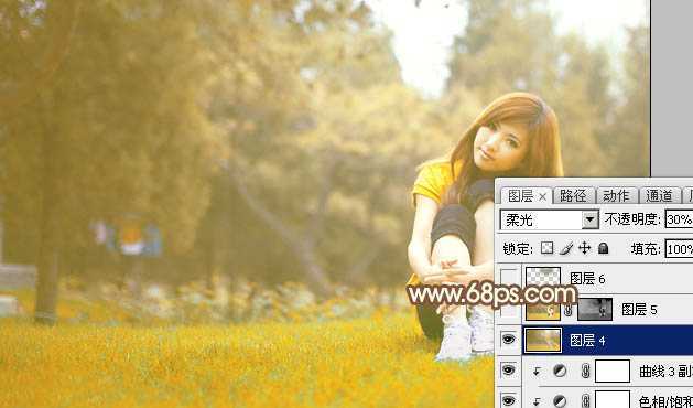 ‘Photoshop将坐在草地上的美女调制出漂亮的秋季阳光色‘