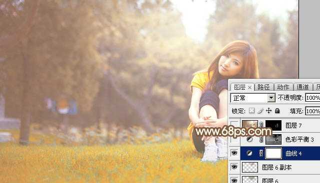 ‘Photoshop将坐在草地上的美女调制出漂亮的秋季阳光色‘