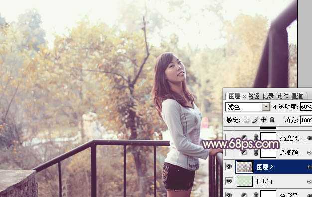 ‘Photoshop将景区人物图片调制出淡淡的蓝黄秋季色‘