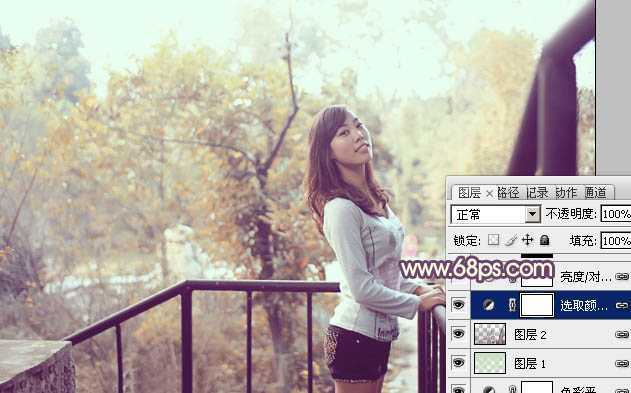 ‘Photoshop将景区人物图片调制出淡淡的蓝黄秋季色‘