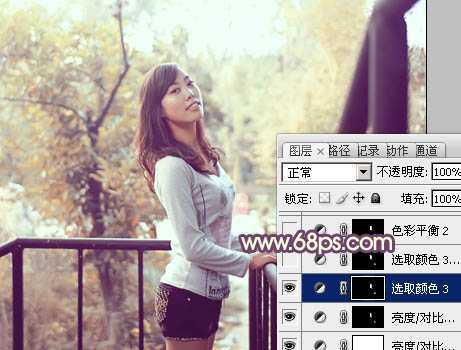 ‘Photoshop将景区人物图片调制出淡淡的蓝黄秋季色‘
