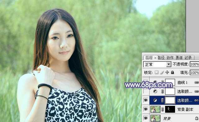 ‘Photoshop将绿树边的美女调制出淡美的蓝黄色‘