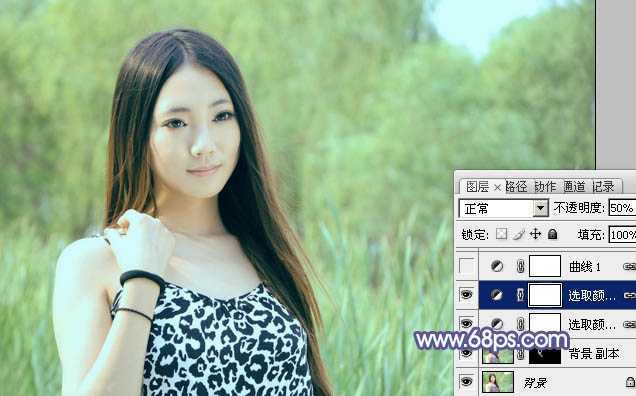 ‘Photoshop将绿树边的美女调制出淡美的蓝黄色‘