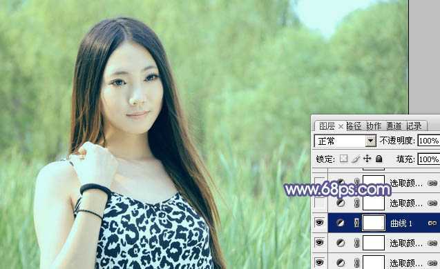 ‘Photoshop将绿树边的美女调制出淡美的蓝黄色‘