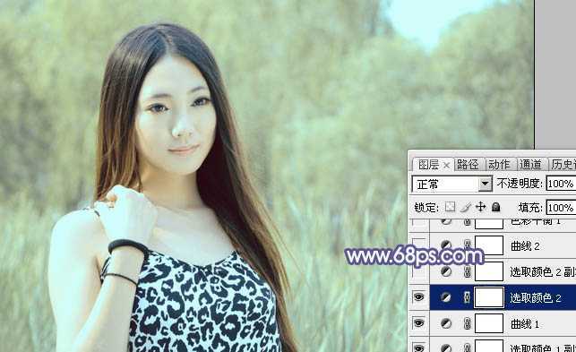 ‘Photoshop将绿树边的美女调制出淡美的蓝黄色‘