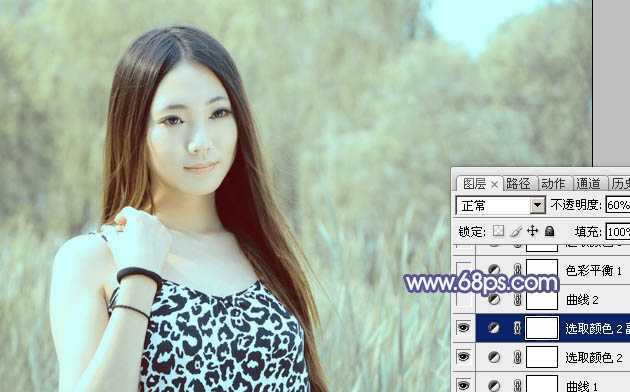 ‘Photoshop将绿树边的美女调制出淡美的蓝黄色‘