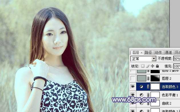 ‘Photoshop将绿树边的美女调制出淡美的蓝黄色‘