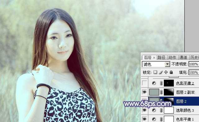 ‘Photoshop将绿树边的美女调制出淡美的蓝黄色‘