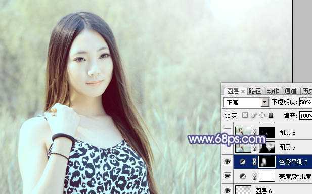‘Photoshop将绿树边的美女调制出淡美的蓝黄色‘