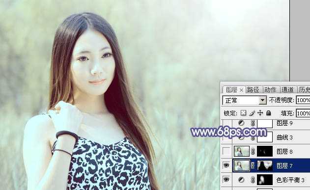 ‘Photoshop将绿树边的美女调制出淡美的蓝黄色‘