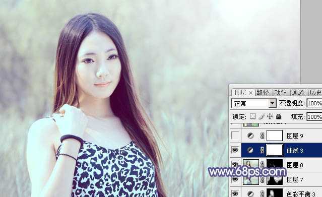 ‘Photoshop将绿树边的美女调制出淡美的蓝黄色‘