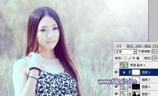 ‘Photoshop将绿树边的美女调制出淡美的蓝黄色‘