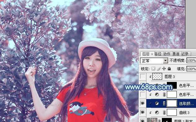 ‘ps利用通道替换为树林中人物调出唯美的蓝红色‘
