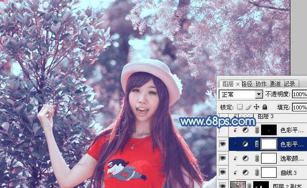 ‘ps利用通道替换为树林中人物调出唯美的蓝红色‘