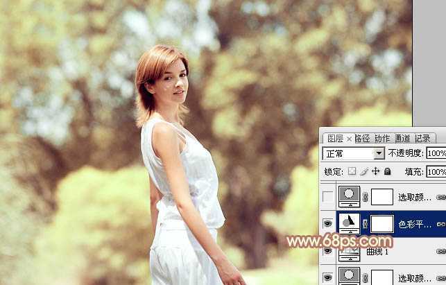 ‘Photoshop将外景人物图片调制出欧美流行的淡调黄褐色‘