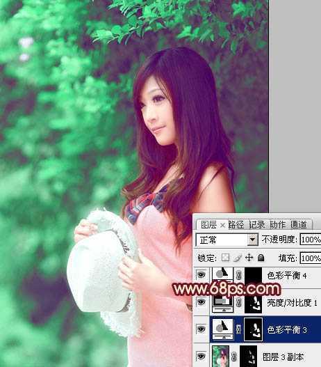 ‘Photoshop将树林美女图片调成甜美的青绿色‘