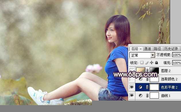 ‘Photoshop为池塘边的美女加上唯美古典黄褐色‘