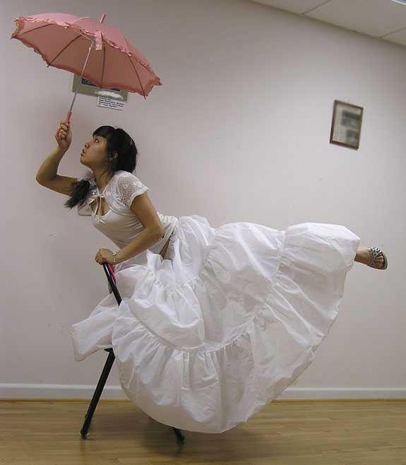 ‘photoshop经典合成海边带伞飞翔的仙女‘