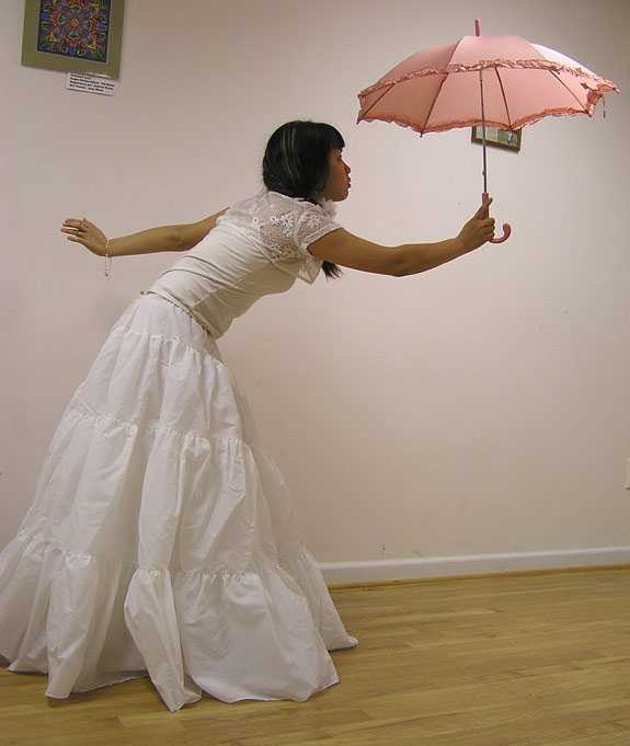 ‘photoshop经典合成海边带伞飞翔的仙女‘