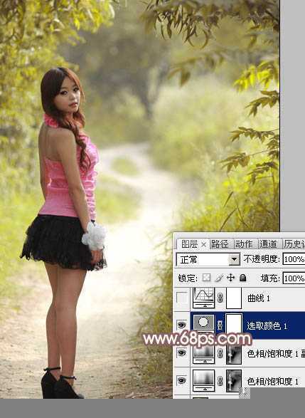 ‘Photoshop为树林小路上的美女调制出唯美的秋季淡暖色‘