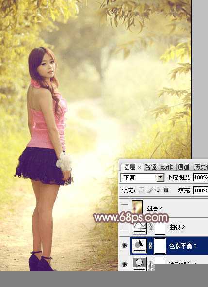 ‘Photoshop为树林小路上的美女调制出唯美的秋季淡暖色‘