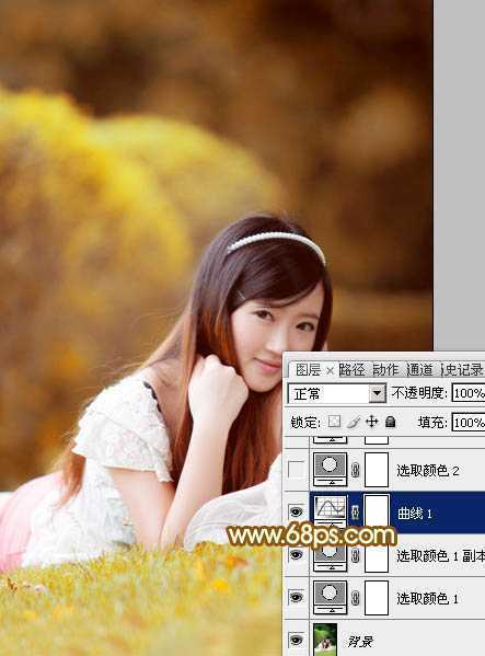 ‘Photoshop将趴在草地上的可爱女孩加上甜美的秋季黄褐色‘