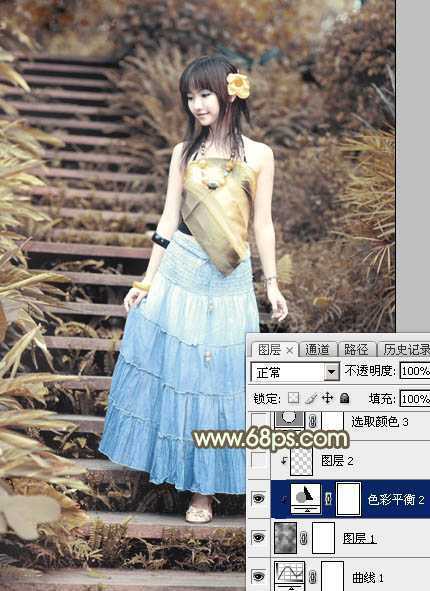 ‘Photoshop为台阶上的美女加上唯美的阳光暖褐色‘