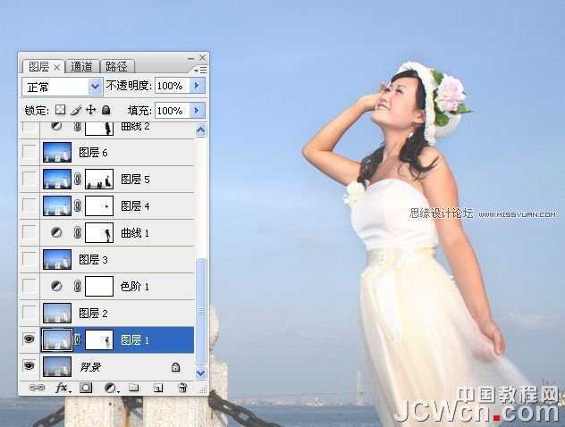 ‘Photoshop调出海景人物图片纯美的蓝色调‘