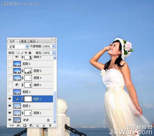 ‘Photoshop调出海景人物图片纯美的蓝色调‘