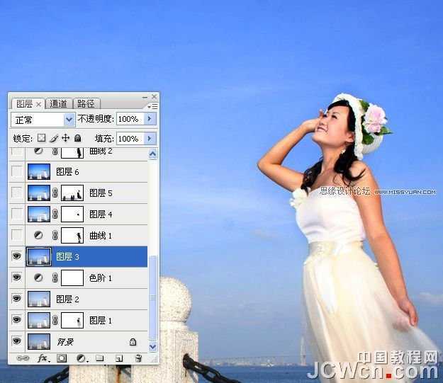 ‘Photoshop调出海景人物图片纯美的蓝色调‘