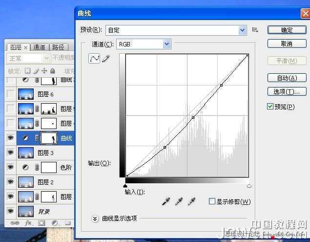 ‘Photoshop调出海景人物图片纯美的蓝色调‘