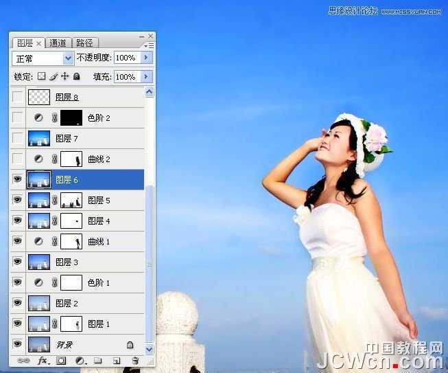 ‘Photoshop调出海景人物图片纯美的蓝色调‘