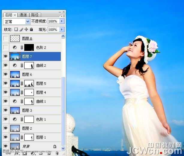 ‘Photoshop调出海景人物图片纯美的蓝色调‘