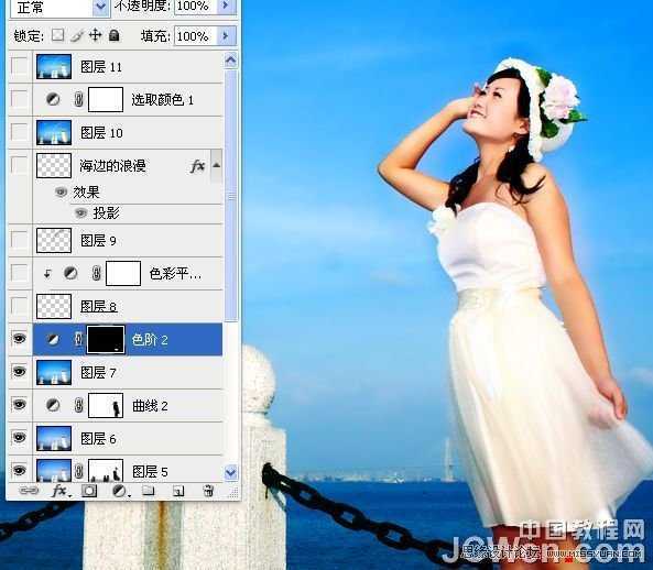 ‘Photoshop调出海景人物图片纯美的蓝色调‘