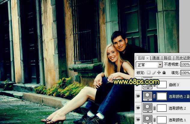 ‘Photoshop调出欧美暗青色建筑边的情侣图片‘