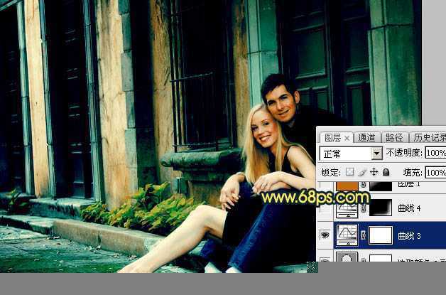 ‘Photoshop调出欧美暗青色建筑边的情侣图片‘