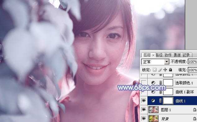 ‘photoshop利用通道替换将树叶边的美女图片调出梦幻的淡蓝色‘