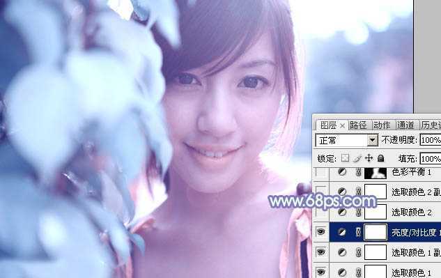 ‘photoshop利用通道替换将树叶边的美女图片调出梦幻的淡蓝色‘