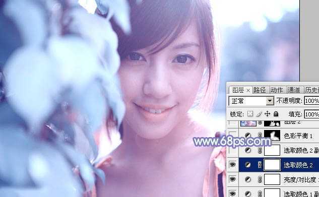 ‘photoshop利用通道替换将树叶边的美女图片调出梦幻的淡蓝色‘