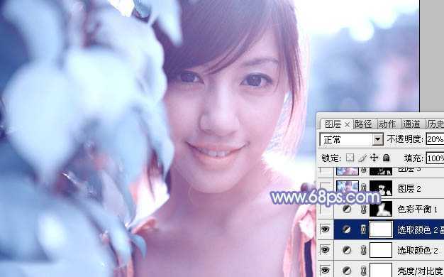 ‘photoshop利用通道替换将树叶边的美女图片调出梦幻的淡蓝色‘