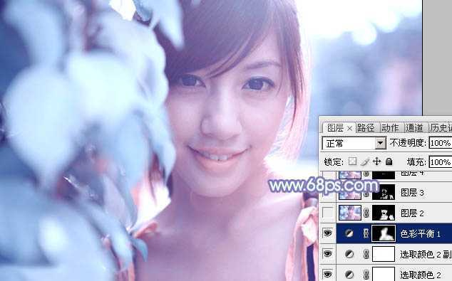 ‘photoshop利用通道替换将树叶边的美女图片调出梦幻的淡蓝色‘
