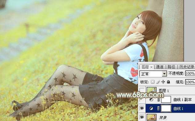 ‘Photoshop将草地美女图片打造柔美的韩系粉黄色‘