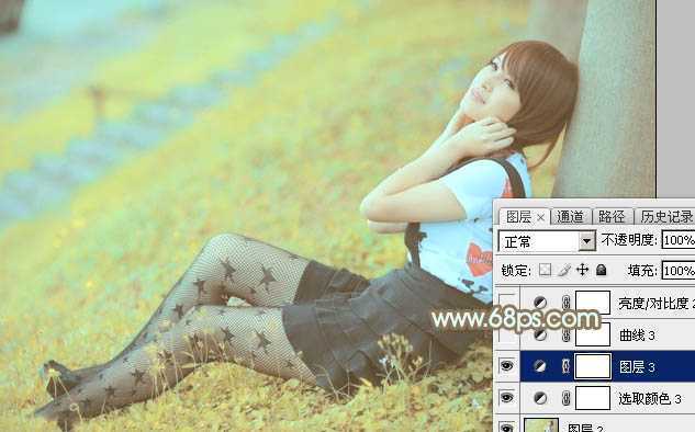 ‘Photoshop将草地美女图片打造柔美的韩系粉黄色‘
